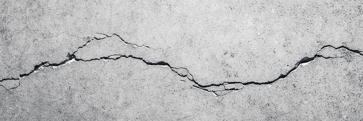 Repairing cracks in concrete foundations